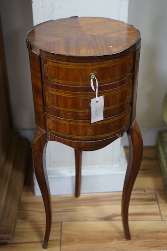 A 19th century Louis XV style French kingwood circular three drawer chest, diameter 30cm, height 70cm